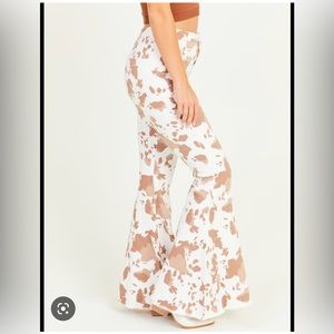 Altar’d state high waisted cow print bell bottoms